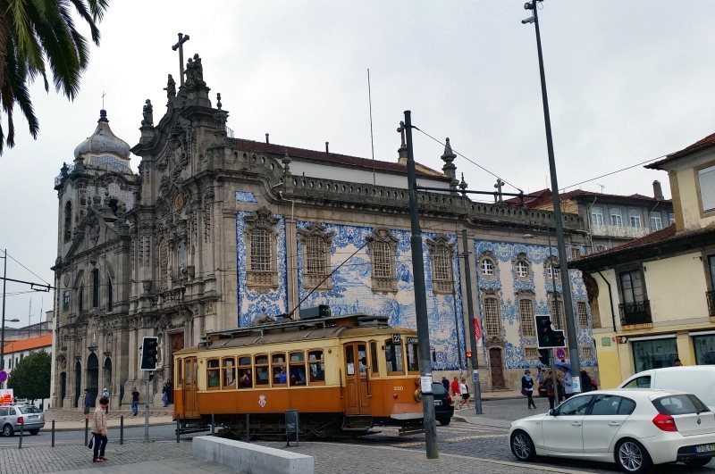 5 Churches with blue tile facades in the city of Porto in Portugal - Church of the Discalced Carmelites and Church of Nossa Senhora do Monte do Carmo.